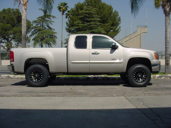 CST Performance Suspension 4.5" Spindle Lift Kit, CST Performance Rear Shock Absorbers, 17"x9" Matte Black KMC XD Series 'Addict' Wheels with 295/70-17 Nitto TerraGrappler A/T Tires.