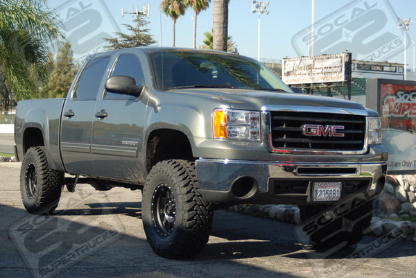 CST Performance Suspension Spindle Lift System and Strut Spacer Used for 6" of Total Lift, Bilstein Rear Shocks, 17" Method Race Wheels in Black Finish, 35x12.50x17 Toyo Open Country M/T Tires, Magnaflow 3" Custom Cat-back Exhaust System