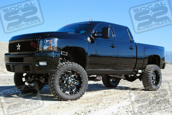 CST Performance Suspension 8-10" Lift System Featuring Dual 2.0 King Remote Reservoir Front Shocks, 2.5" King Remote Reservoir Rear Shocks, 22" BMF Novakane Wheels in "Death Metal Black" Finish, 37" Toyo Open Country M/T Tires, RBP RX Series 1 Pc. Mesh Grill With SoCal SuperTrucks Badge, Eagle Eye OEM Replacement Headlight & Taillight Assemblies, and a Mag Hy-Tec High Capacity Rear Diff Cover