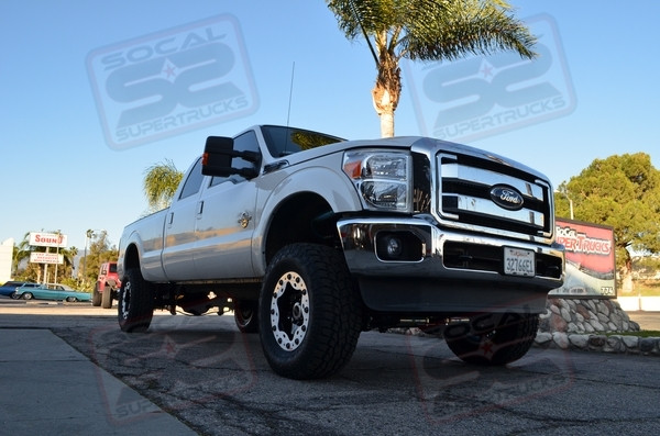 4.5" Carli Suspension King 2.5 Piggyback Reservoir Pintop System, Dual Bilstein 5100 Series Steering Stabilizer's, 35x12.50x18 Toyo Open Country All Terrain 2's Wrapped on 18" OMF Custom Beadlock Wheels, Amp Research Powersteps, Firestone Ride Rite Helper Air Bag Kit