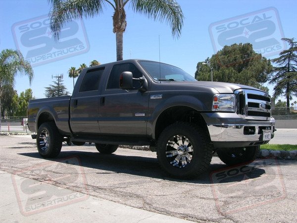 6" Fabtech Suspension Lift, 18" Black/Machined Diamo 8 Karat Wheels Mounted on Some 295/70/18 Nitto Terragrappler Tires