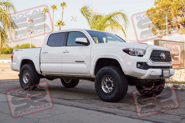 2019 Toyota Tacoma - Bilstein Shocks - 2.5" Lift - KMC Wheels - Toyo Tires