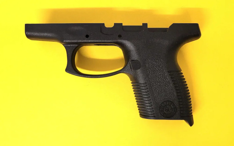 Taurus PT 140 Grip Frame with Magazine Release and Spring