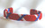 Show off your Proud to be an American by wearing our Red White and Blue Ribbon Cuff Bracelet.  Aluminum base with creatively decorative wrapped ribbon.

Perfect for individual inspiration, school groups/events, donation requests and for whatever your creative imagination brings.