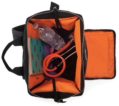Side/back view of the koi utility backpack showcasing comfortable padded straps, roomy capacity, and practical organization features designed for professionals and students.