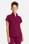 The HH752 Quest Bella Women’s Partial Zip Stand Collar Top is shown in classic Wine with matching Wine pants, styled against a clean white background. The short‑sleeve partial‑zip design and structured stand collar create a modern, professional uniform look ideal for healthcare, hospitality, and other active work environments.