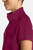 The HH752 Quest Bella Women’s Partial Zip Stand Collar Top is shown in a close‑up view emphasizing its Wine short‑sleeve construction, smooth partial‑zip collar, and practical chest pocket holding a pen. The clean, professional detailing reinforces its purpose as a dependable uniform top for healthcare, hospitality, and other active roles.