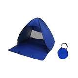 A blue pop-up beach tent with a matching carry bag, featuring a spacious interior and a lightweight design.