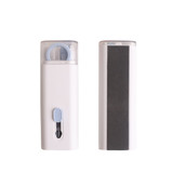 A white 7-in-1 cleaning kit featuring different tools, including a blue roller and a textured surface for cleaning.