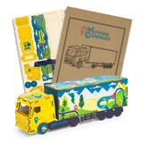 A wooden model of a large truck in yellow and blue, accompanied by craft sheets and assembly instructions.