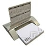 A silver pop-up combo pad dispenser with white notepads. Features a grey and white design, including branding. A silver pop-up combo pad dispenser with white notepads. Features a grey and white design, including branding.