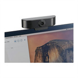 A black 1080P HD webcam with a built-in microphone mounted on a computer monitor.