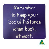 A purple mouse mat featuring a message about social distancing, with a logo indicating it is Australian made.