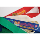 A collection of brightly coloured fabric bands in red, green, blue, and cream, featuring various designs and logos.