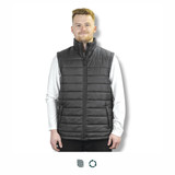 A man wearing a grey unisex puffer vest with a zip front and side pockets, featuring a logo.