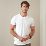 A white men's active sports T-shirt displayed on a male model against a neutral background. The shirt features a logo.