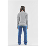 A back view of a woman wearing a grey Henley shirt with flared blue jeans. The shirt has a logo on it.