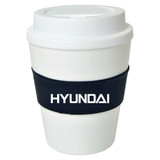 A large white cup with a black silicone band, featuring a logo. Ideal for drinks on the go.