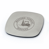 A square metal coaster in a silver colour, featuring a logo in the centre.
