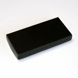 A black rectangular box with a smooth surface and no visible markings or branding.