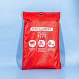 A red fire blanket in a protective bag featuring a logo and illustrated instructions for use.