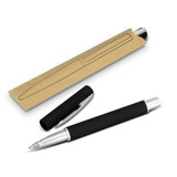 A black rollerball pen with a silver tip, displayed alongside its packaging.