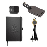 A black notebook, a luggage tag, a charging cable with multiple connectors, and a power bank, all featuring branding.