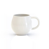 A white mug with a unique rounded design and a sturdy handle, featuring a smooth surface and no visible branding.
