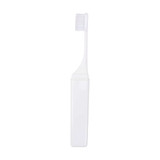 A foldable travel toothbrush in white, featuring a compact design and a protective case.