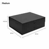A medium-sized black gift box with a ribbon, featuring two drawers and dimensions of 26 cm by 32 cm by 10.5 cm.