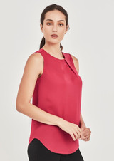 A sleeveless blouse in deep red with pleat detail, featuring a rounded hem and a subtle brand logo. A sleeveless blouse in deep red with pleat detail, featuring a rounded hem and a subtle brand logo.