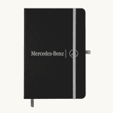A black A5 notebook with an elastic closure and a logo on the front, featuring a grey band and bookmark.