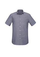 A short sleeve button-up shirt in a blue grey tone with a pocket and a logo on the chest.