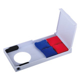 A compact game set with red and blue bean bags stored in a white case featuring a circular opening. A compact game set with red and blue bean bags stored in a white case featuring a circular opening.