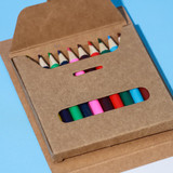 A notepad set featuring a brown cardboard case containing assorted coloured pencils in various hues.