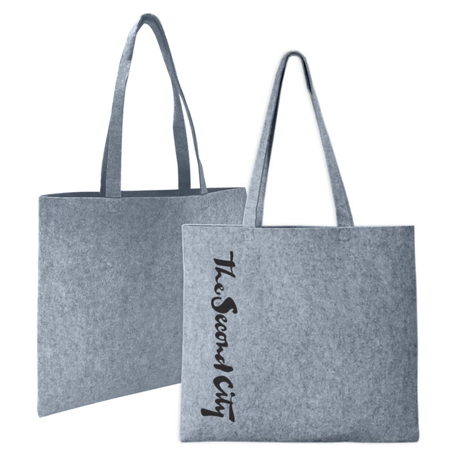 A grey felt tote bag with long handles and a logo on one side.