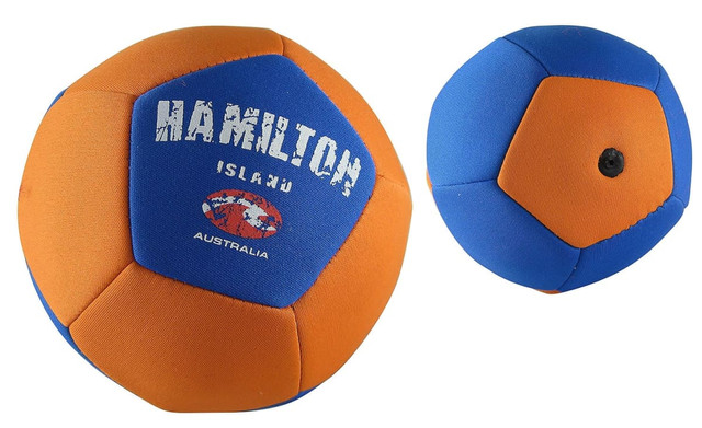 A large soccer ball featuring a blue and orange design, with a logo on the surface. A large soccer ball featuring a blue and orange design, with a logo on the surface.