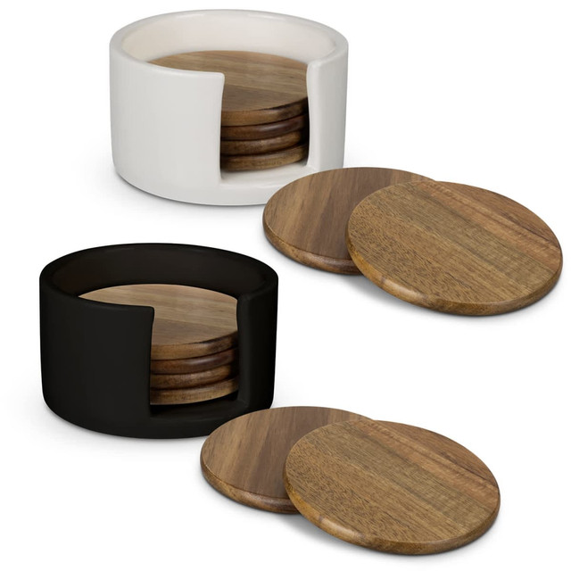 A set of round wooden coasters in white and black holders, featuring a natural wood finish. A set of round wooden coasters in white and black holders, featuring a natural wood finish.