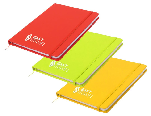 A notepad featuring a red, neon green, and yellow cover, each with a logo on the front. A notepad featuring a red, neon green, and yellow cover, each with a logo on the front.