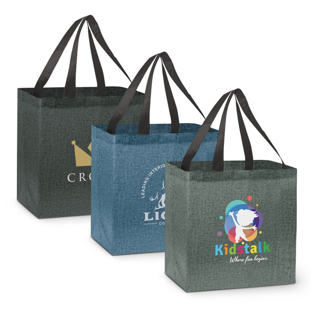 A set of three tote bags in grey, green, and blue, featuring various logos and branding on each.