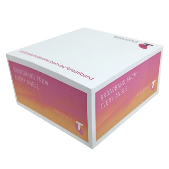 A cube-shaped note pad featuring a colourful gradient design in pink and orange, printed on four sides, with a logo. A cube-shaped note pad featuring a colourful gradient design in pink and orange, printed on four sides, with a logo.