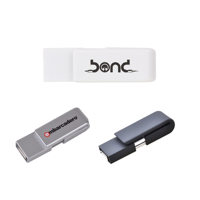 Three flash drives in grey and white, featuring different designs and a logo on one drive.