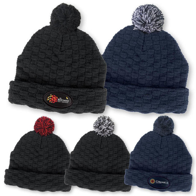 A collection of Pom Pom Beanies in navy and black, featuring a textured design and logos on the front.