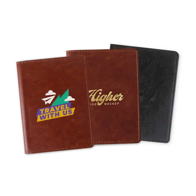 Three PU leather passport holders in brown and black, featuring various designs and a logo on one.