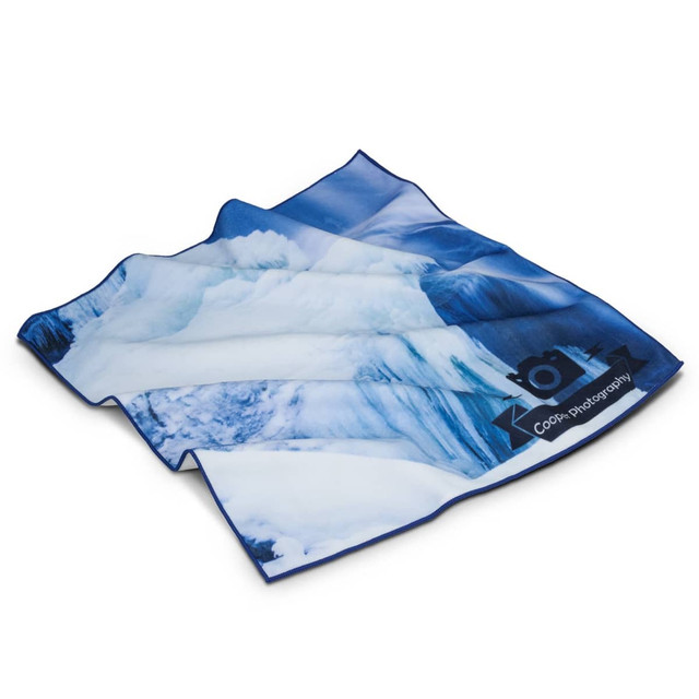 A large magic cover featuring a blue and white ice-themed design, with a logo on one side.
