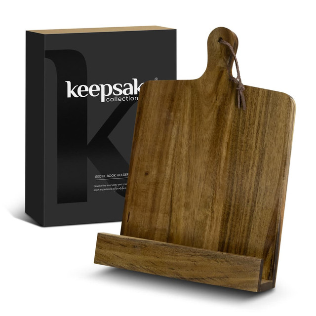 A wooden recipe book holder in a natural finish, presented with a sleek black packaging box featuring a logo.