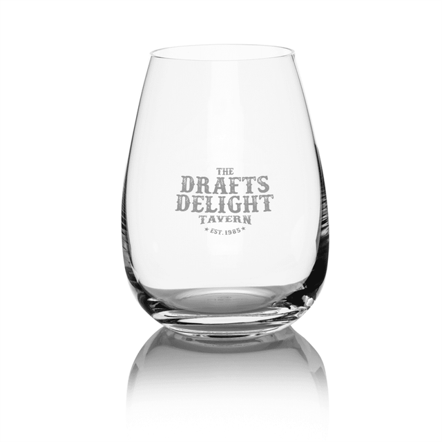 A stemless wine glass with a clear design, featuring an engraved logo and a smooth, rounded shape.