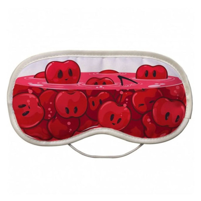 A full colour eye mask featuring a playful design of red cherries in a liquid. It has a logo on the side.