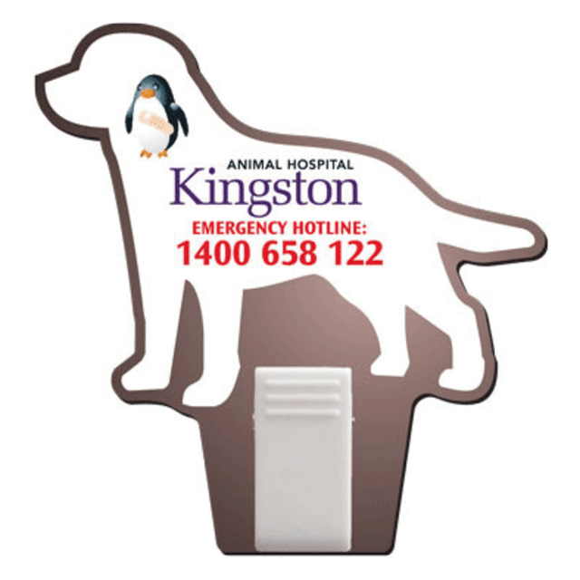 A custom-shaped magnet in the form of a dog, featuring a logo and a white clip at the bottom.