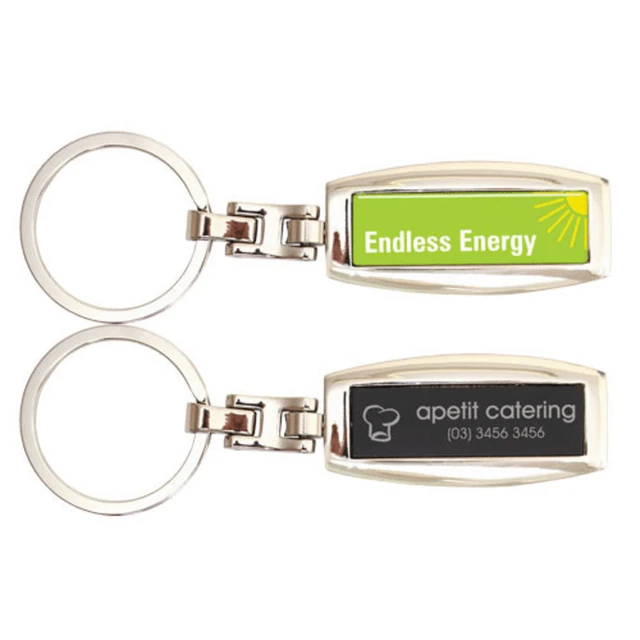 A metal keyring with a silver finish, featuring a green side with logo and a black side for branding.